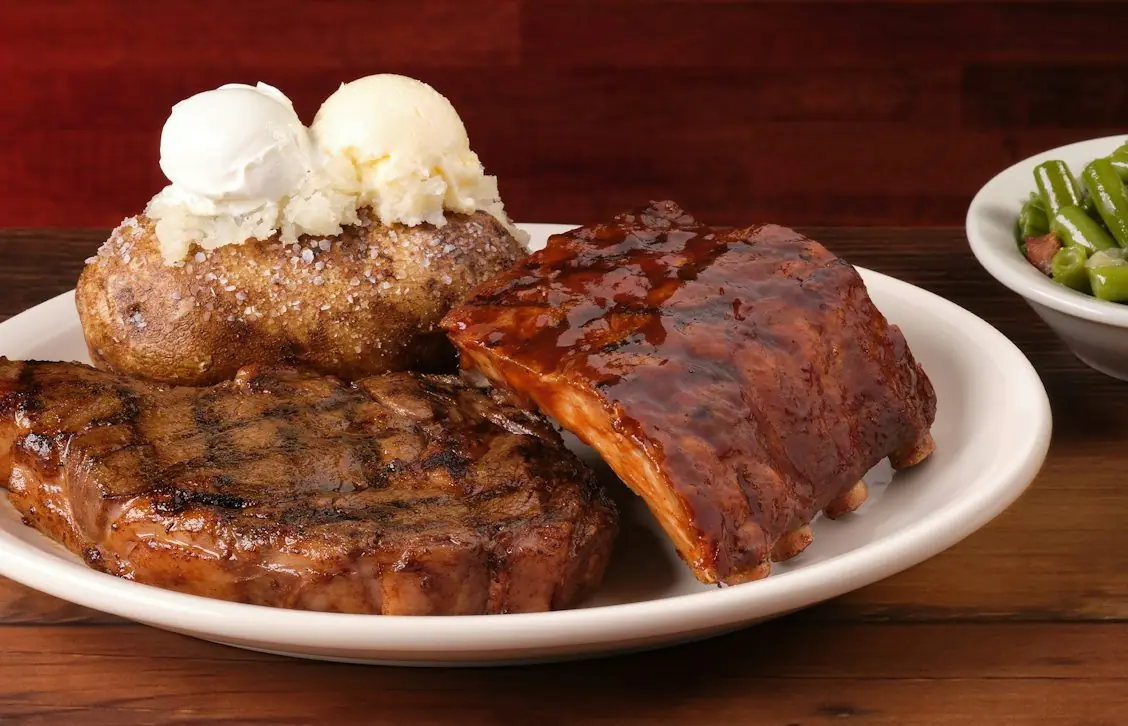 Photo of Ribeye* 12oz & Ribs.